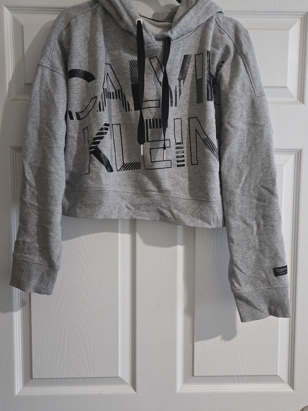 Calvin Klein Gray Cropped Logo Hoodie with Black Drawstrings